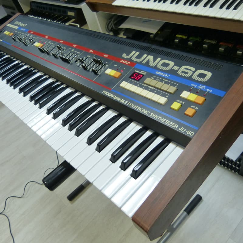 1982 - 1984 Roland Juno-60 61-Key Polyphonic Synthesizer Black - used Roland       Midi