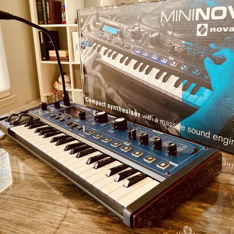 2012 - Present Novation MiniNova 37-Key 18-Voice Synthesizer Blue - used Novation            Analog  Keyboard Synth