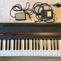90s-00s Casio CPS 7 Black with some wood effect trim used
