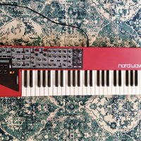 used 2007 - 2013 Nord Wave 49-Key 18-Voice Polyphonic Synthesizer Red